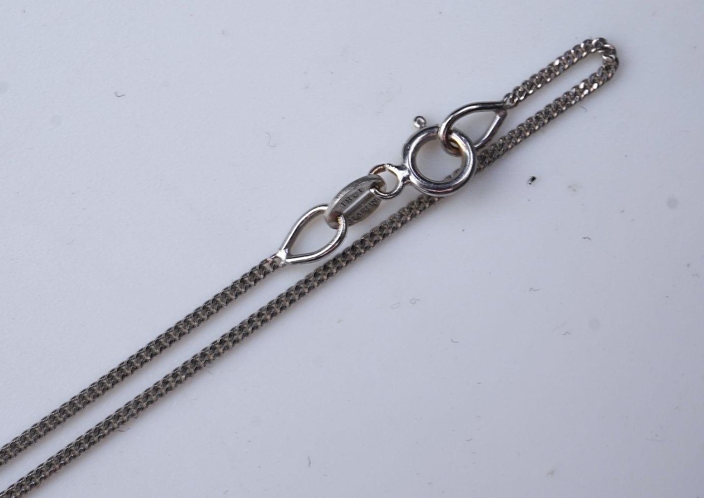 A diamond pendant necklace